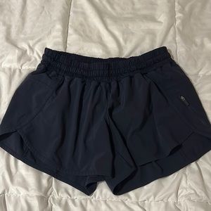 Navy blue lululemon track that shorts